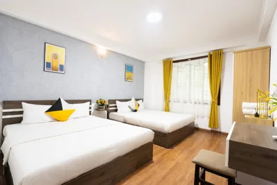 Chambre Deluxe familiale — Planet Saigon Hotel