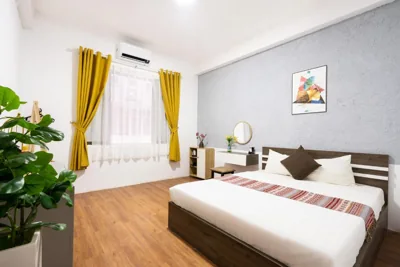 Chambre Deluxe King — Planet Saigon Hotel